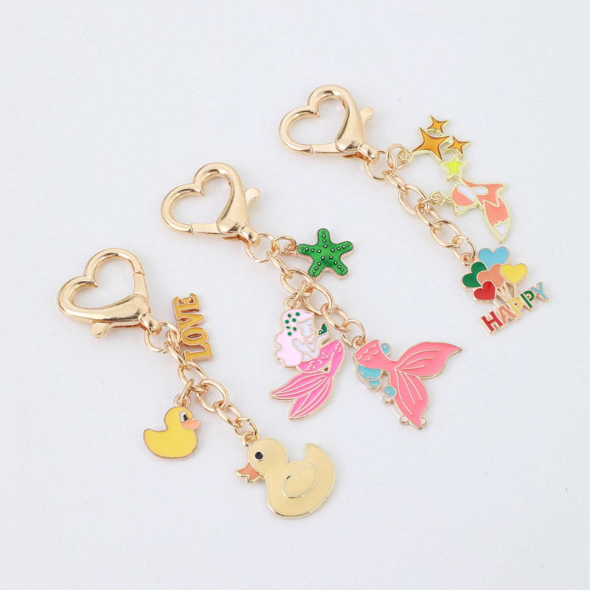 Wholesale Heart duck mermaid metal keychain